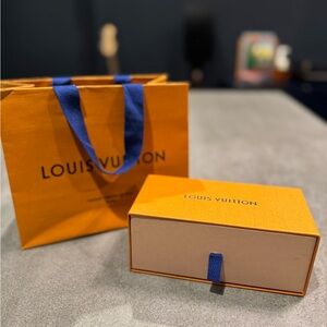 Louis Vuitton carton box and shopping bag. Authentic.